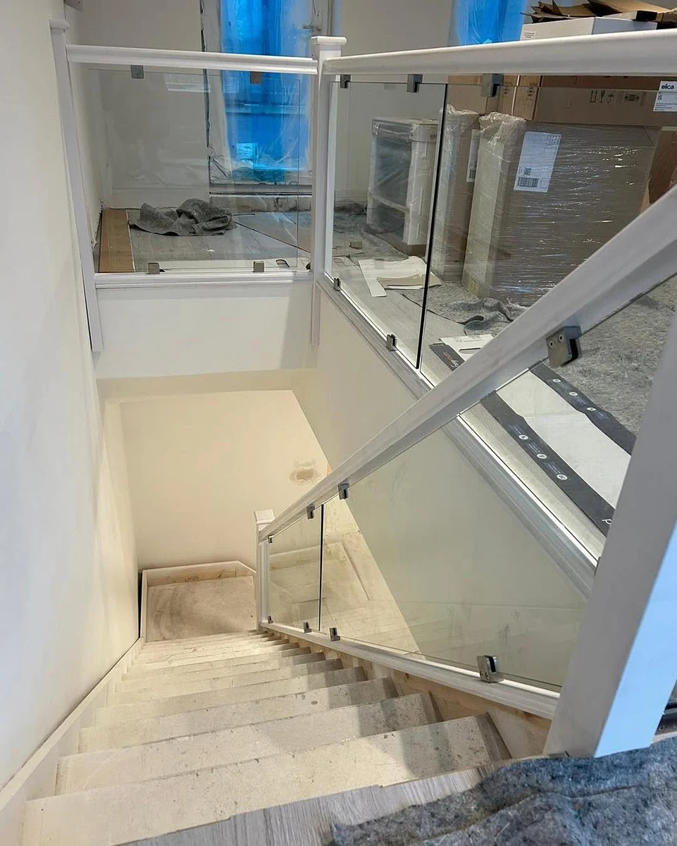 White post glass balustrade at stair landing, Maidstone Glass Balustrades